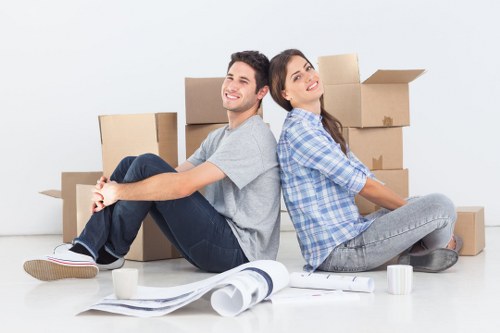 Removal team handling household furniture in Bayswater