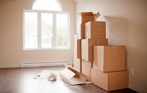 Local man and van moving boxes in a Bayswater street