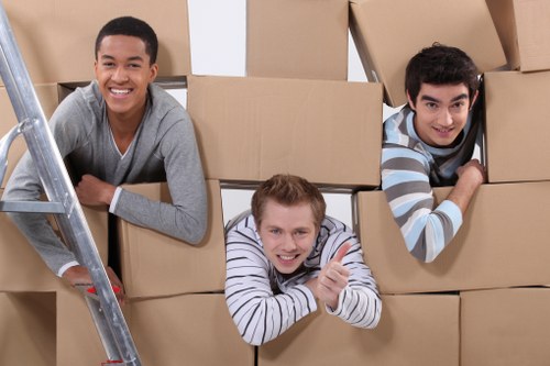 Packed boxes and furniture ready for local removal service