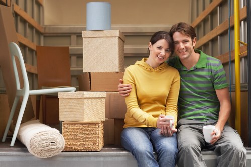 Loading household items into a van for a move in Bayswater
