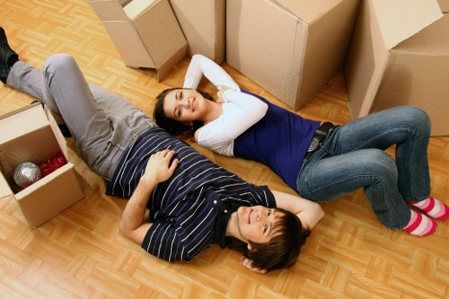 Loading furniture into a van near Bayswater streets