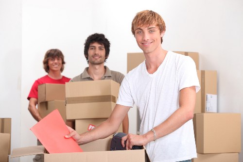 Residential removal service in Bayswater with packed boxes and van